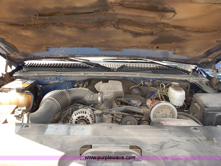 image for item E7800 2003 Chevrolet Silverado 3500 flatbed stake side truck