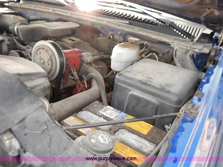 image for item E7800 2003 Chevrolet Silverado 3500 flatbed stake side truck