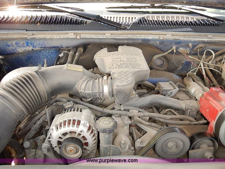 image for item E7800 2003 Chevrolet Silverado 3500 flatbed stake side truck