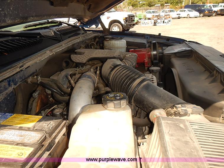 image for item E7800 2003 Chevrolet Silverado 3500 flatbed stake side truck