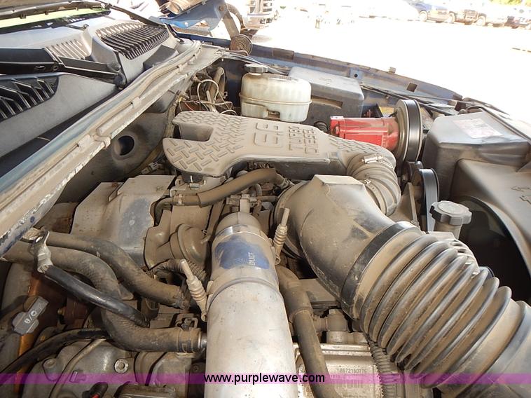 image for item E7800 2003 Chevrolet Silverado 3500 flatbed stake side truck