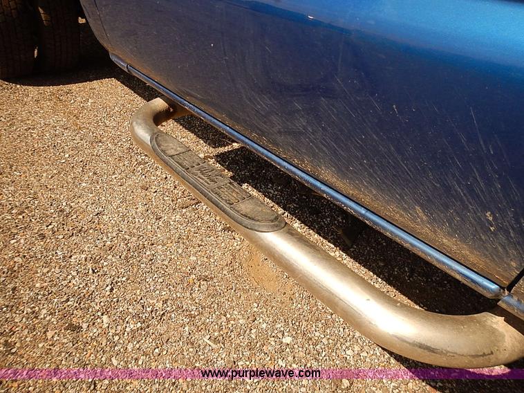 image for item E7800 2003 Chevrolet Silverado 3500 flatbed stake side truck