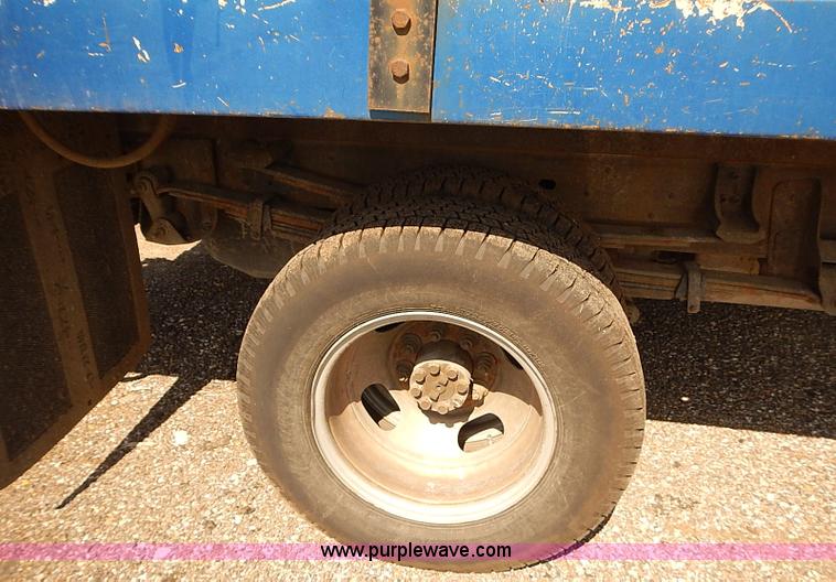 image for item E7800 2003 Chevrolet Silverado 3500 flatbed stake side truck