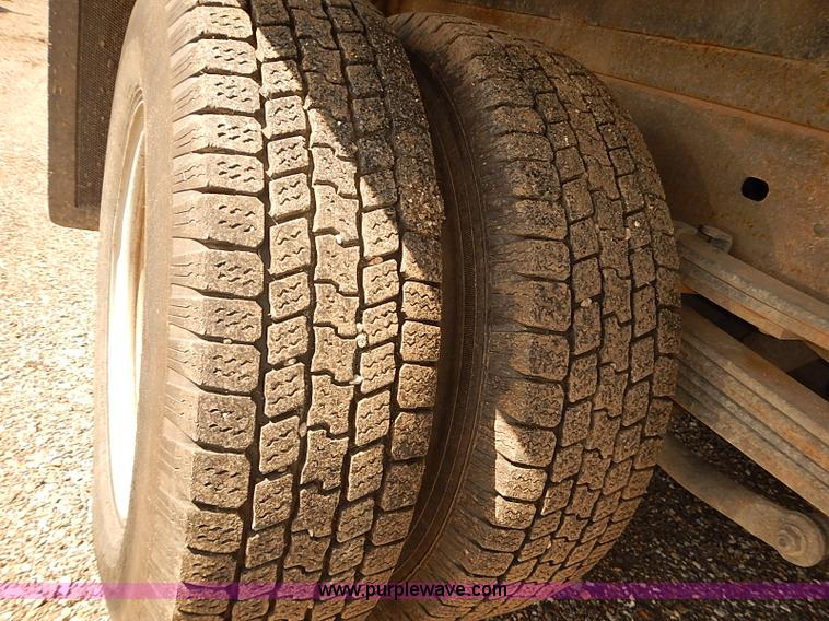 image for item E7800 2003 Chevrolet Silverado 3500 flatbed stake side truck