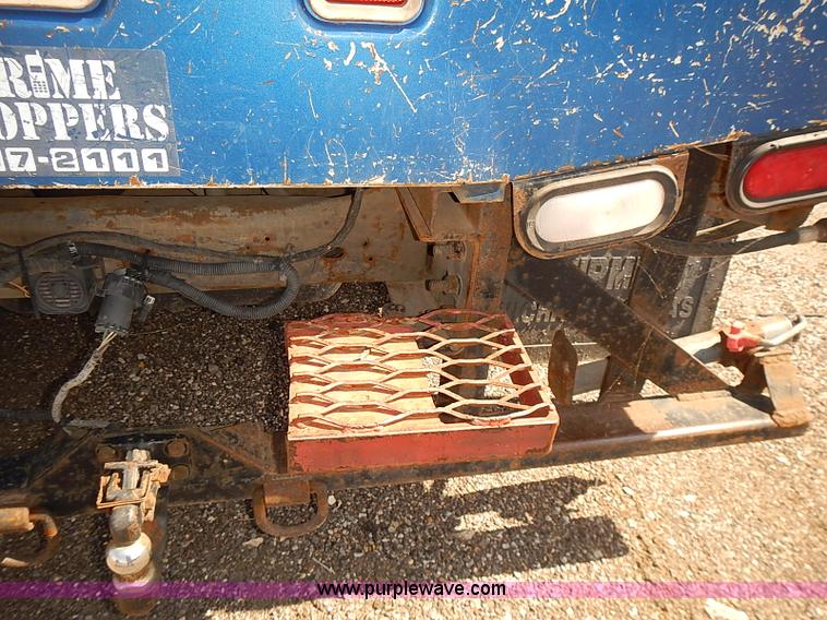 image for item E7800 2003 Chevrolet Silverado 3500 flatbed stake side truck