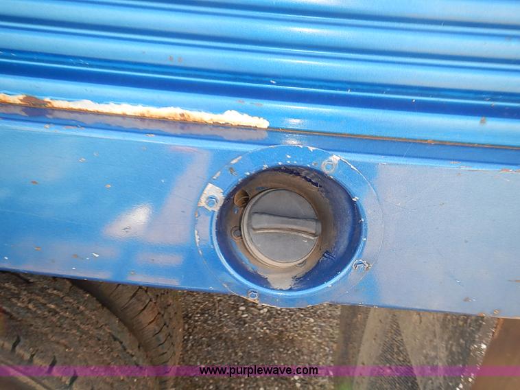 image for item E7800 2003 Chevrolet Silverado 3500 flatbed stake side truck