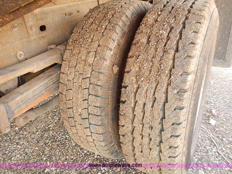 image for item E7800 2003 Chevrolet Silverado 3500 flatbed stake side truck