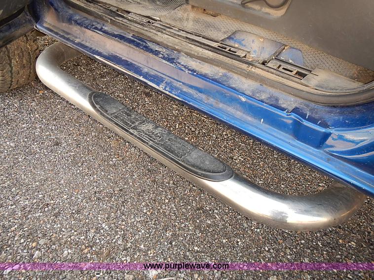 image for item E7800 2003 Chevrolet Silverado 3500 flatbed stake side truck