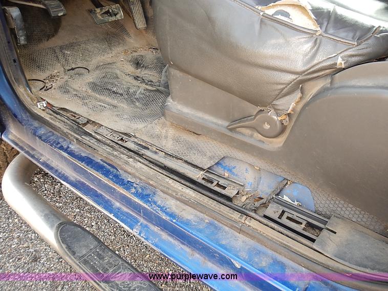 image for item E7800 2003 Chevrolet Silverado 3500 flatbed stake side truck