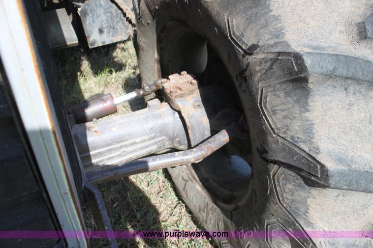 image for item F3322 Massey-Ferguson 698 MFWD tractor