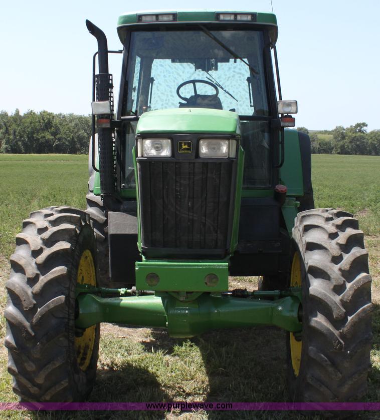 image for item F3327 1999 John Deere 7710 MFWD tractor