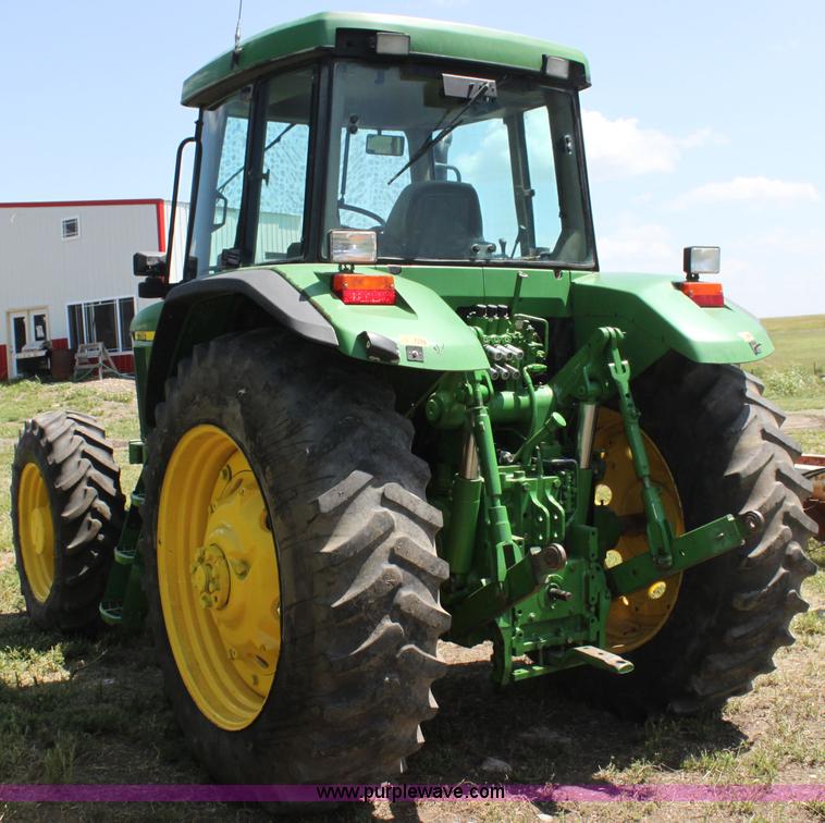 image for item F3327 1999 John Deere 7710 MFWD tractor