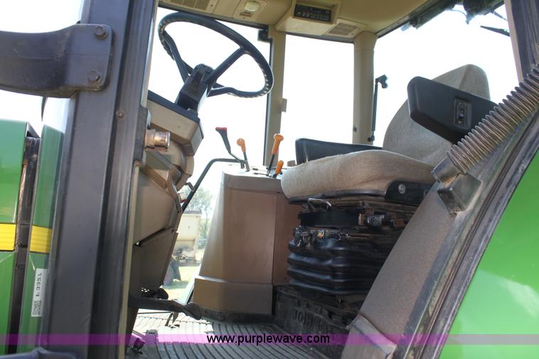 image for item F3327 1999 John Deere 7710 MFWD tractor
