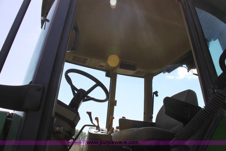 image for item F3327 1999 John Deere 7710 MFWD tractor