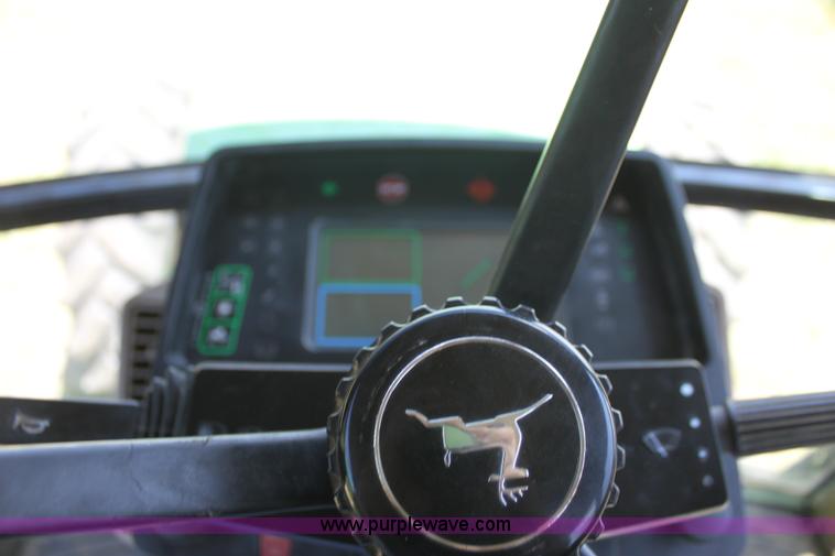 image for item F3327 1999 John Deere 7710 MFWD tractor