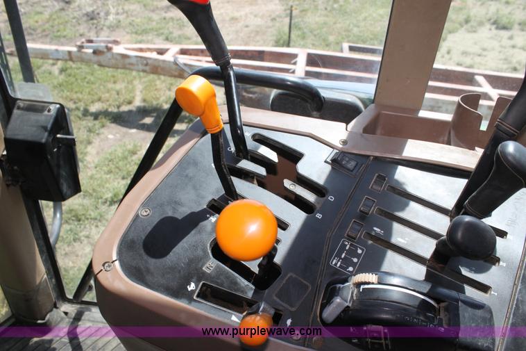 image for item F3327 1999 John Deere 7710 MFWD tractor