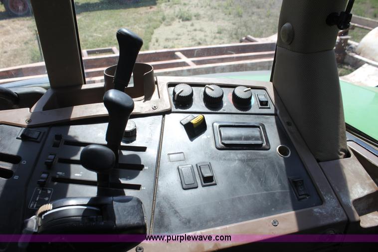 image for item F3327 1999 John Deere 7710 MFWD tractor