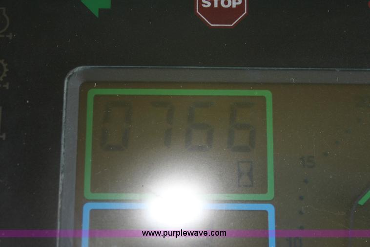 image for item F3327 1999 John Deere 7710 MFWD tractor