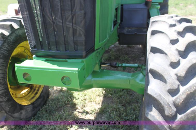 image for item F3327 1999 John Deere 7710 MFWD tractor