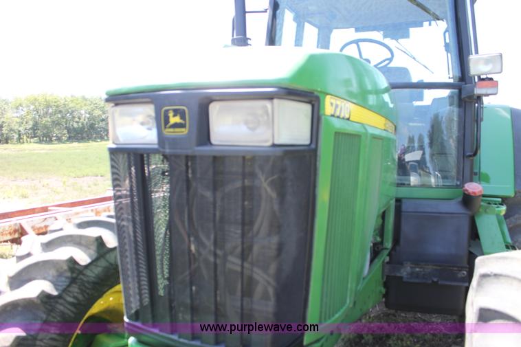 image for item F3327 1999 John Deere 7710 MFWD tractor