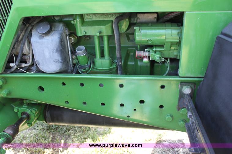 image for item F3327 1999 John Deere 7710 MFWD tractor