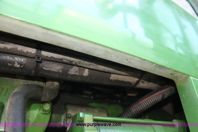 image for item F3327 1999 John Deere 7710 MFWD tractor