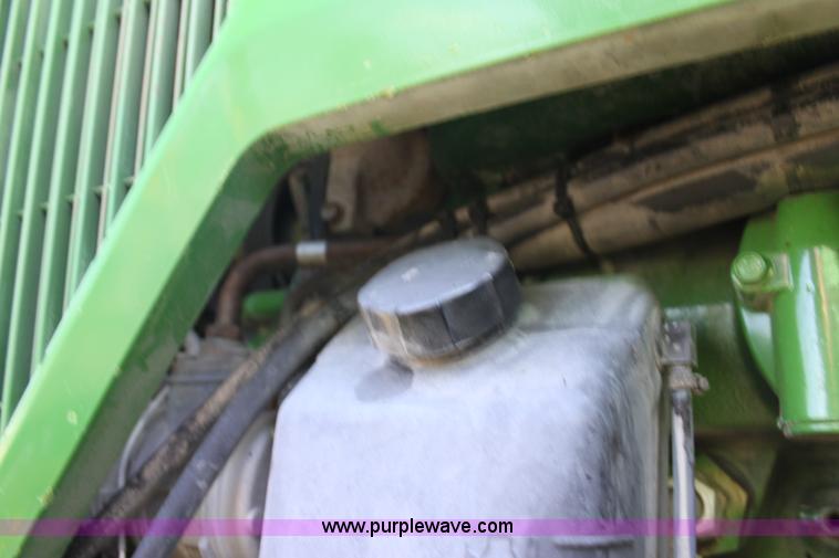 image for item F3327 1999 John Deere 7710 MFWD tractor