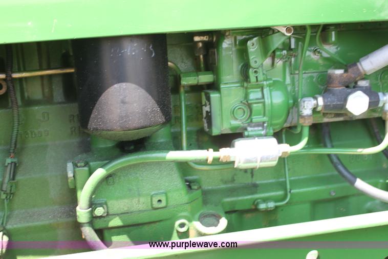 image for item F3327 1999 John Deere 7710 MFWD tractor