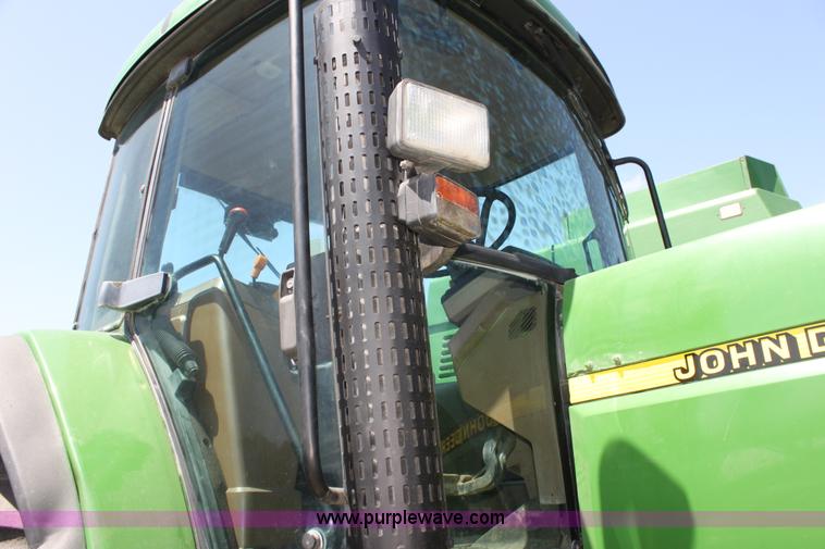 image for item F3327 1999 John Deere 7710 MFWD tractor
