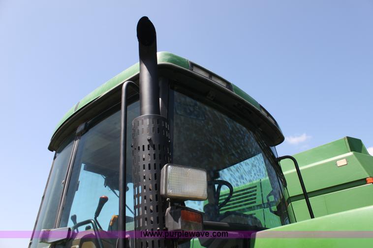 image for item F3327 1999 John Deere 7710 MFWD tractor