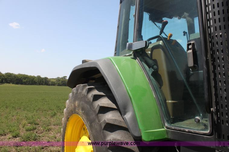 image for item F3327 1999 John Deere 7710 MFWD tractor