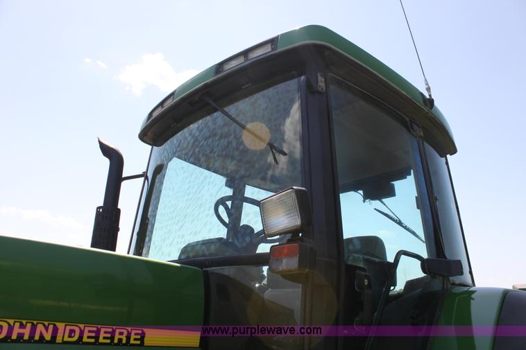 image for item F3327 1999 John Deere 7710 MFWD tractor