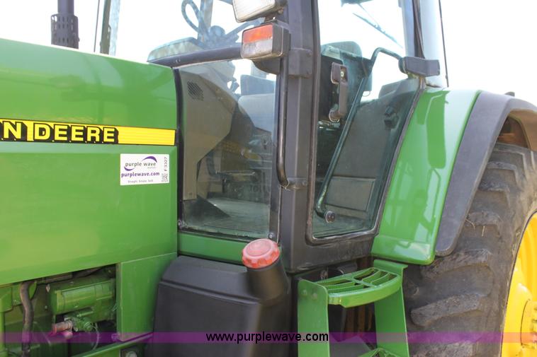 image for item F3327 1999 John Deere 7710 MFWD tractor