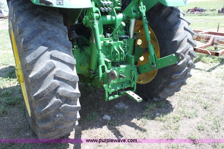 image for item F3327 1999 John Deere 7710 MFWD tractor
