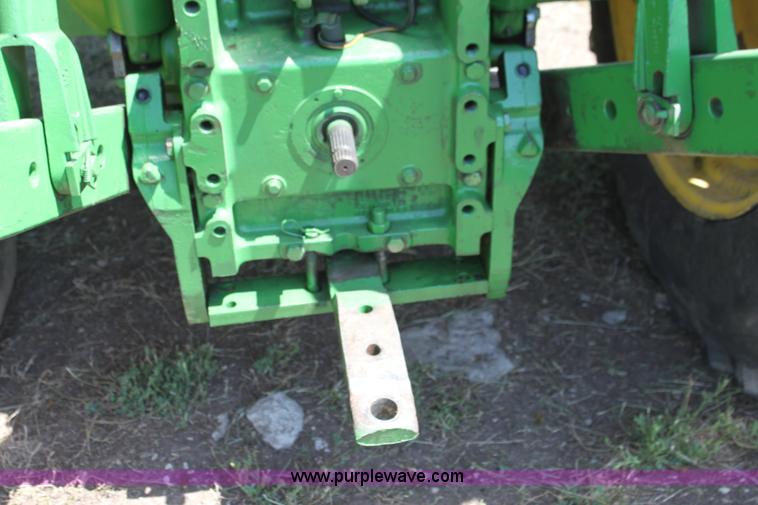 image for item F3327 1999 John Deere 7710 MFWD tractor