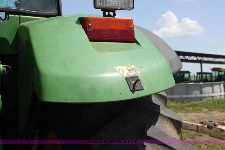 image for item F3327 1999 John Deere 7710 MFWD tractor