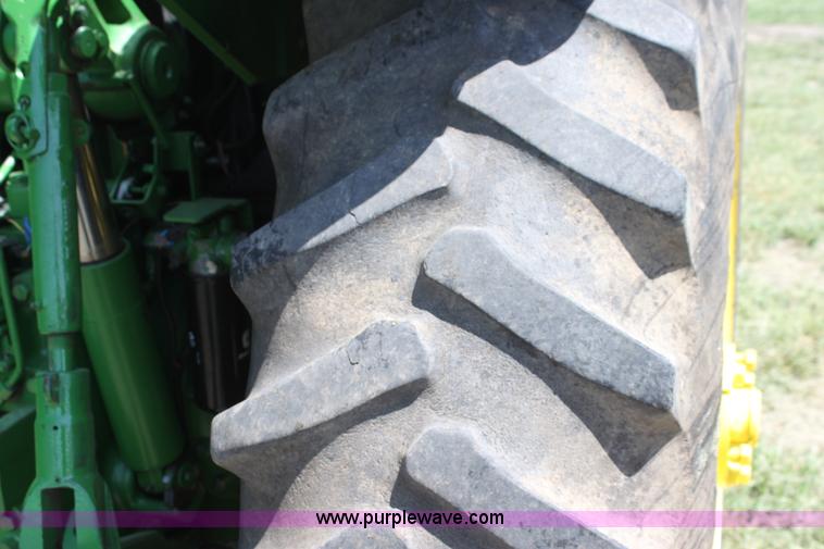 image for item F3327 1999 John Deere 7710 MFWD tractor