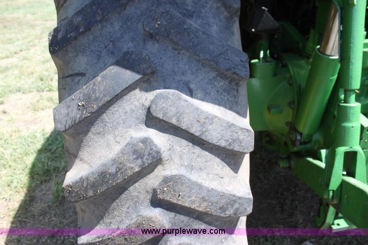 image for item F3327 1999 John Deere 7710 MFWD tractor