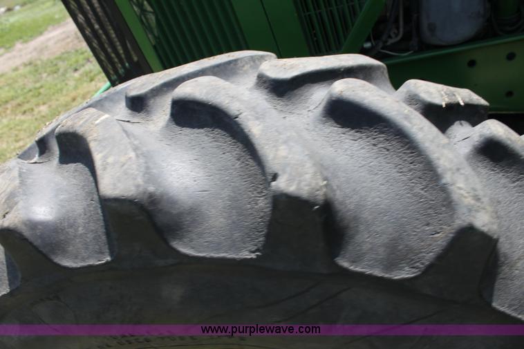 image for item F3327 1999 John Deere 7710 MFWD tractor