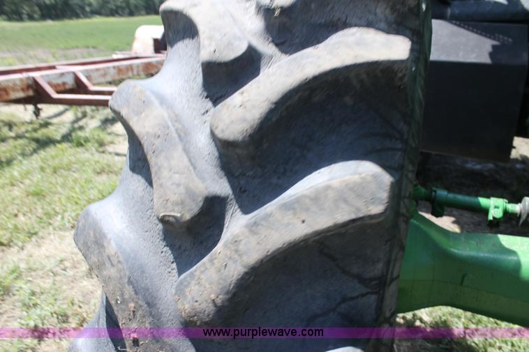 image for item F3327 1999 John Deere 7710 MFWD tractor