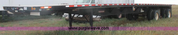 image for item H1736 2006 Fontaine EFTW-7-8048WSAWK flatbed trailer