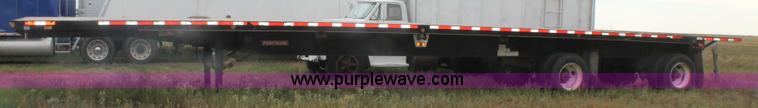 image for item H1736 2006 Fontaine EFTW-7-8048WSAWK flatbed trailer
