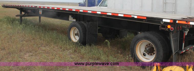 image for item H1736 2006 Fontaine EFTW-7-8048WSAWK flatbed trailer