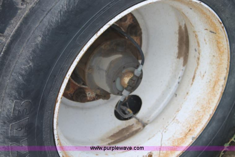 image for item H1736 2006 Fontaine EFTW-7-8048WSAWK flatbed trailer