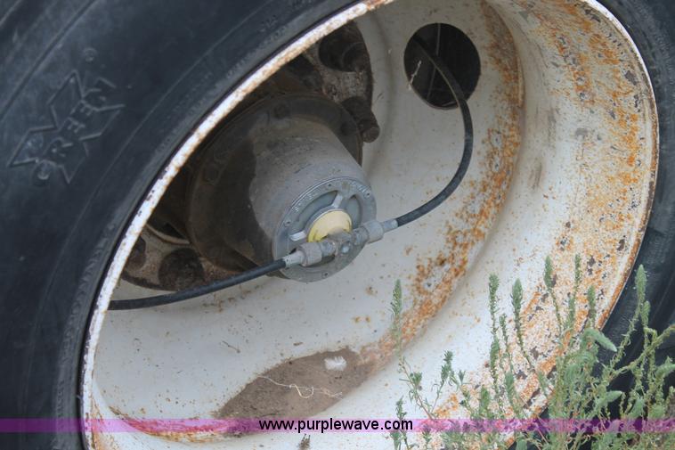 image for item H1736 2006 Fontaine EFTW-7-8048WSAWK flatbed trailer