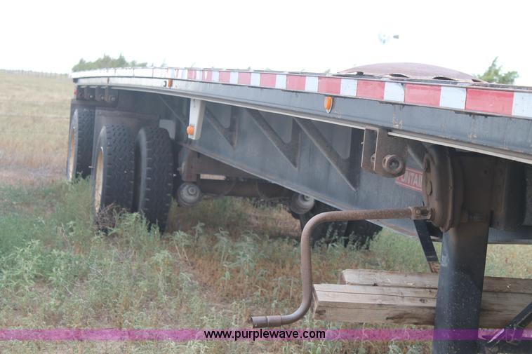 image for item H1736 2006 Fontaine EFTW-7-8048WSAWK flatbed trailer