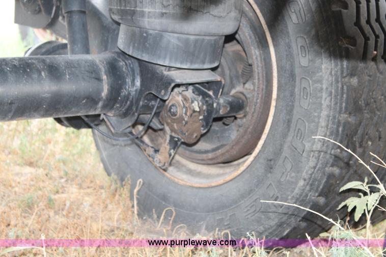 image for item H1736 2006 Fontaine EFTW-7-8048WSAWK flatbed trailer