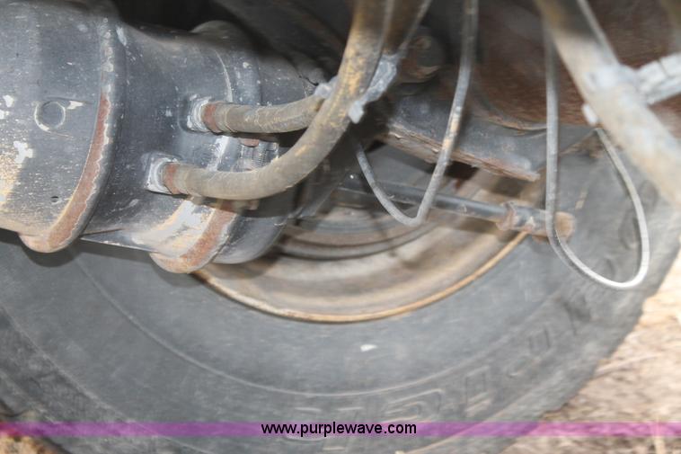 image for item H1736 2006 Fontaine EFTW-7-8048WSAWK flatbed trailer