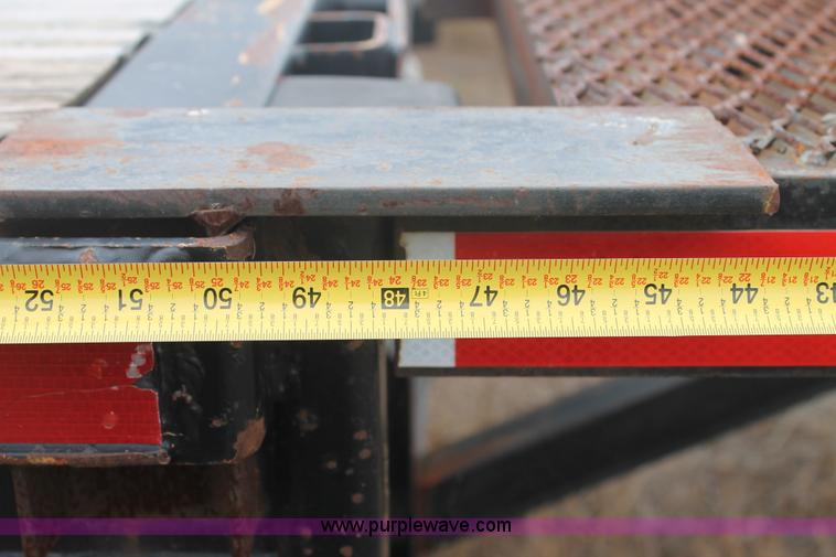 image for item H1736 2006 Fontaine EFTW-7-8048WSAWK flatbed trailer