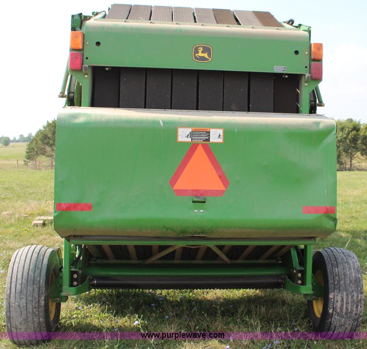 image for item J2008 2003 John Deere 567 round baler